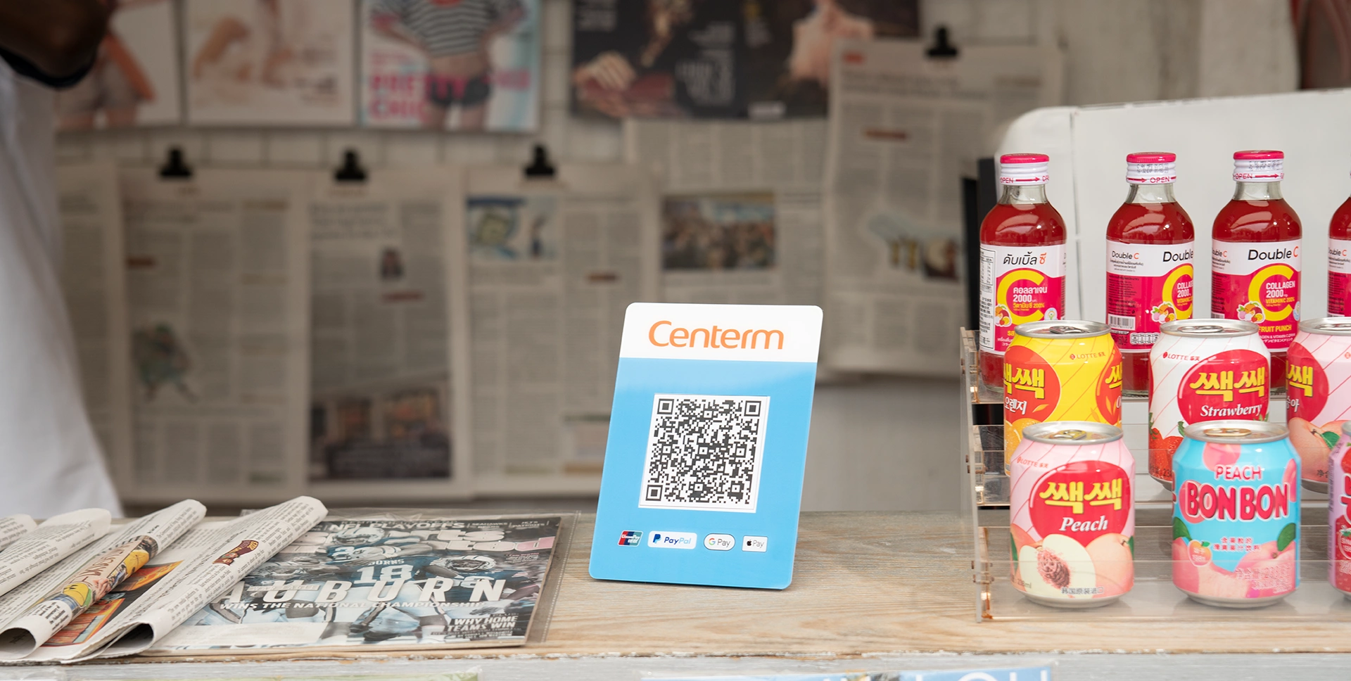 S03 QR stand at a newsstand